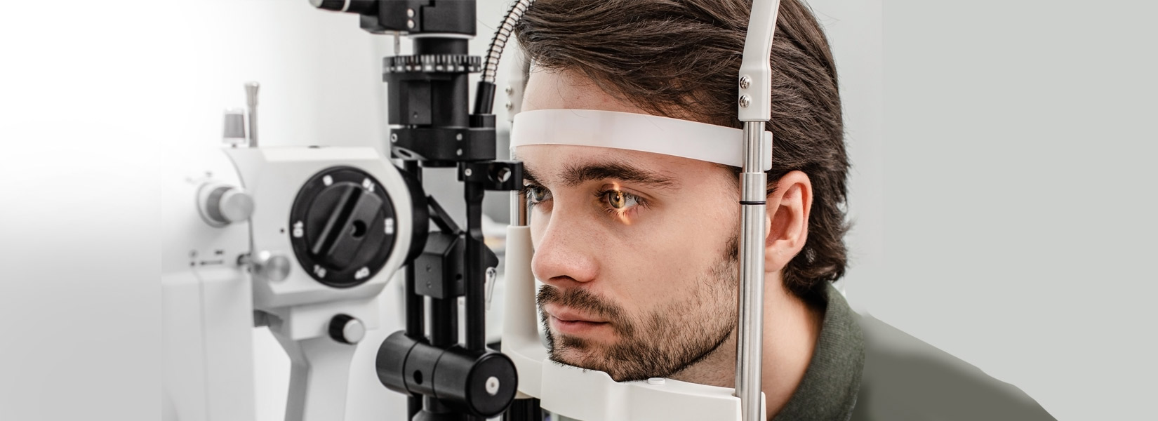 young man during eye exam in Paris